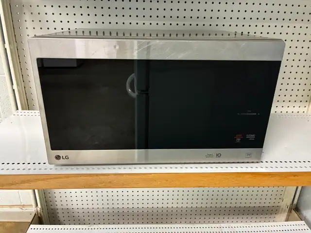 Microwave LG Stainless - 90-day warranty - Credit Cards Accepted
