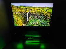 $780 OBO- Like New 65' 4K Smart TV    TV stand with Lights
