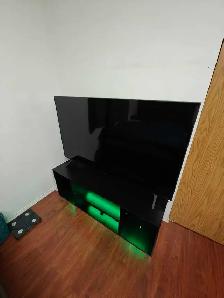 $780 OBO- Like New 65' 4K Smart TV    TV stand with Lights - Photo 2