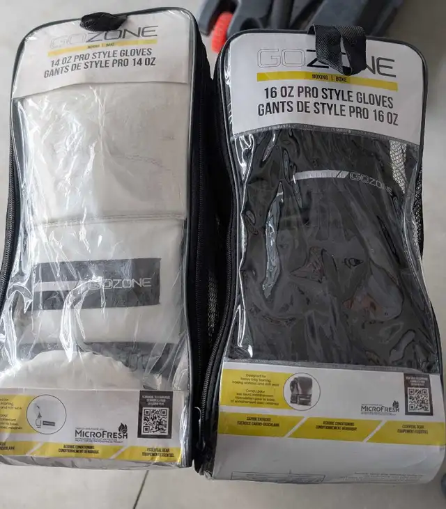 2 Sets of Boxing gloves for sale!