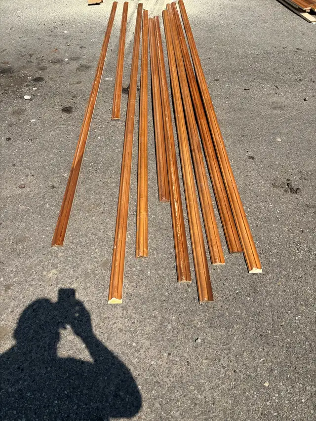 over 100 feet of 2 1/2 inch hard wood baseboard or casing