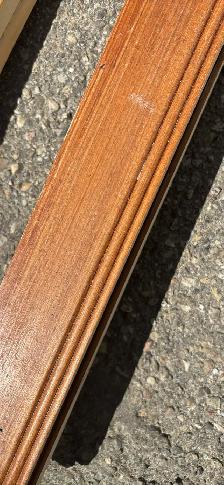 over 100 feet of 2 1/2 inch hard wood baseboard or casing - Photo 3