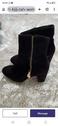 Excellent condition Micheal Kors Size 10 black boots for sale!
