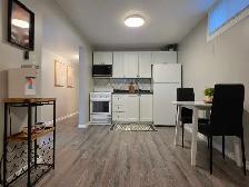 Furnished 2-Bedroom Basement Suite | Private Entrance - Photo 2