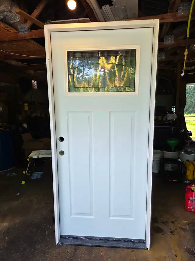 New Exterior Door with Frame.