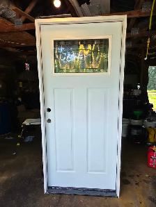 New Exterior Door with Frame.