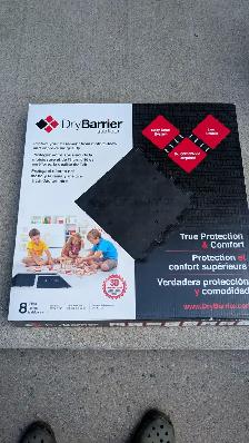 Dry Barrier waterproof subfloor tiles for basement floors etc.