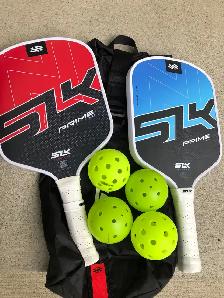 SLK Premium Pickle ball set. 2 paddles, 4 balls and a carry