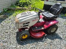 White Outdoor Riding Lawn Mower