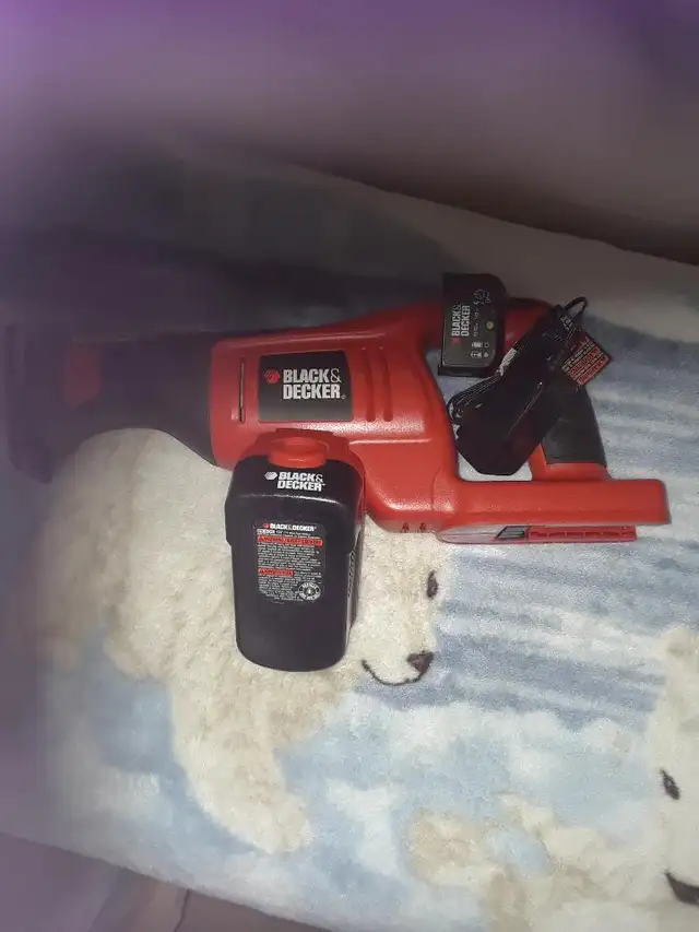 Black& Decker cordless Reciprocating with 1 battery, charger $65