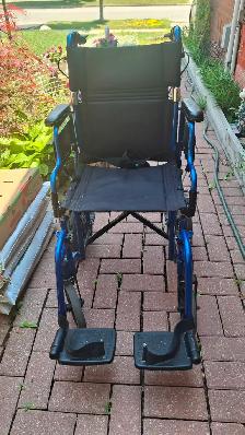 Wheelchair folding transport