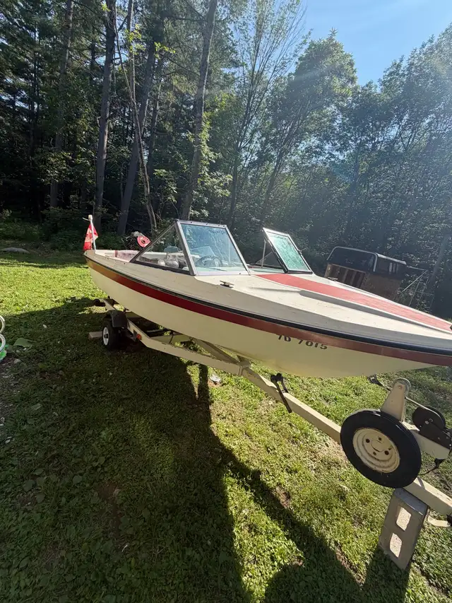 boat and trailer with 80hp mercury