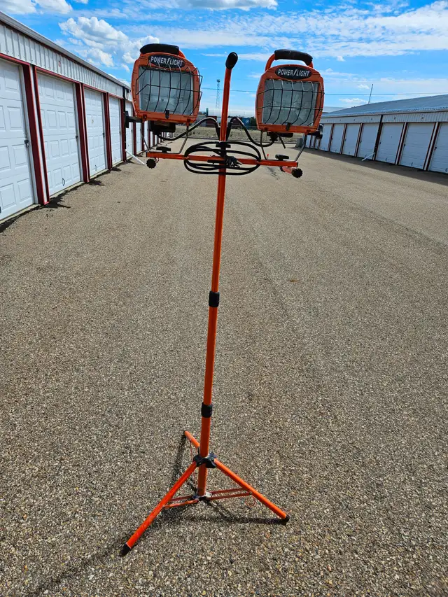 2-Work lights, telescoping tri-pod stands, $ 10 Each