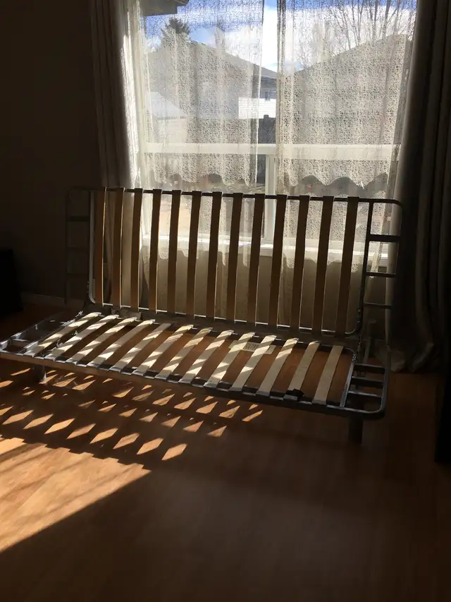 Futon with Brand new matress and Cover