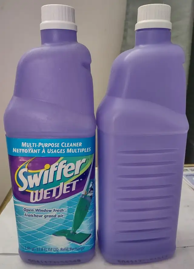 Free: Two empty Swiffer WetJet bottles.
