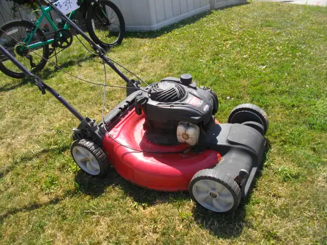 PUSH MOWER NOT SURE IF IT RUNS WAS LEFT IN STORAGE UNIT