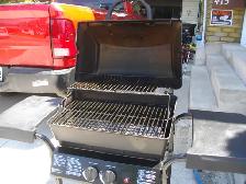 LIKE NEW BBQ  WITH TANK AND GAS - Photo 2