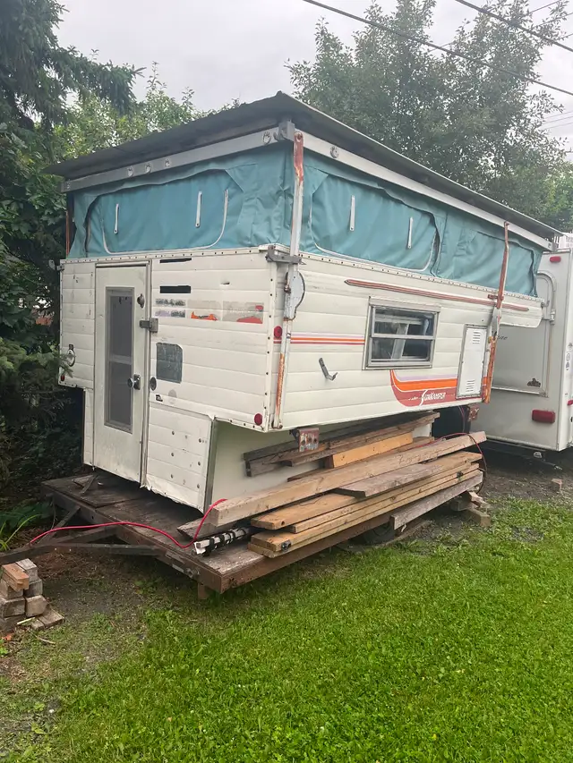 Slide in truck camper. It’s old