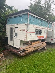 Slide in truck camper. It’s old