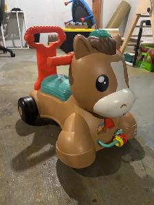 toddler walking horse