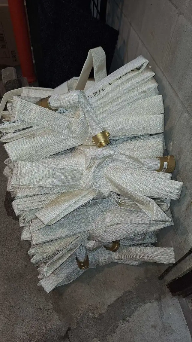 12- 50 ' -1.5 ' never used fire hoses for sale.