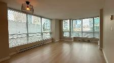 Fresh Paint & New Floor! 2-Bedroom Condo Unit above Crystal Mall