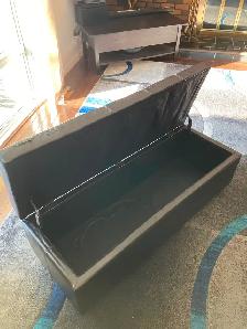 Fake leather storage bench with wear on the top. - Photo 2