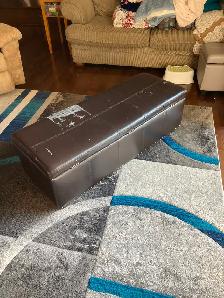 Fake leather storage bench with wear on the top. - Photo 3