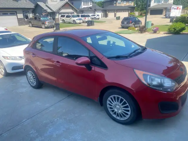 Senior lady driven 2014 Kia Rio 218,000 km