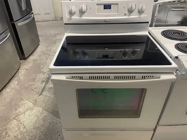 Cuisinière blanche vitrocéramique Whirlpool