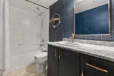 Bright & Modern 2 Bedroom Condo Close to Downtown - Photo 24