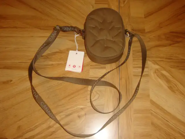 'Lululemon' Team Canada crossbody bag, with carrying strap