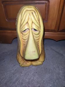Sad dog plastic piggy bank