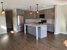 LIKE NEW 3 BEDROOM WITH HEATED GARAGE IN SYLVAN LAKE - Photo 2