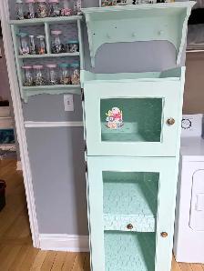 Small armoire made of wood with chicken wires