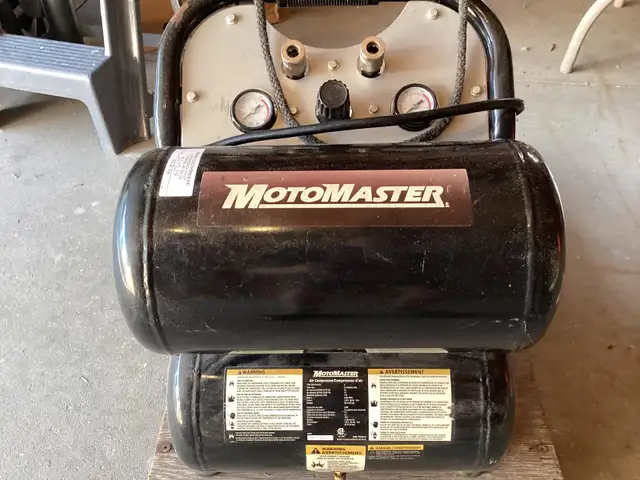 5 gallon dual tank air compressor.$120.00