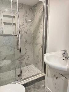 Spacious 2-Bedroom Basement Oasis with Private Sunroom - Photo 3