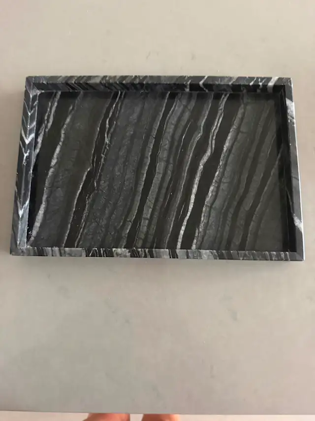 Dark marble tray from linen chest