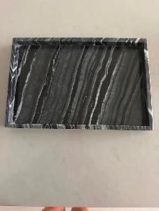 Dark marble tray from linen chest