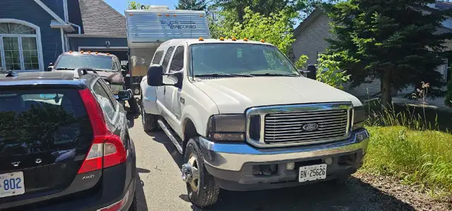 2003 Ford F 350 dually with Parts Truck