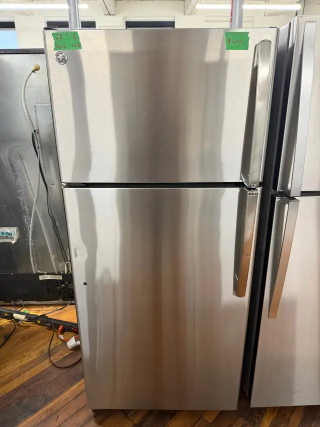 GE scratch and dent new 24 inch stainless steel steel fridge