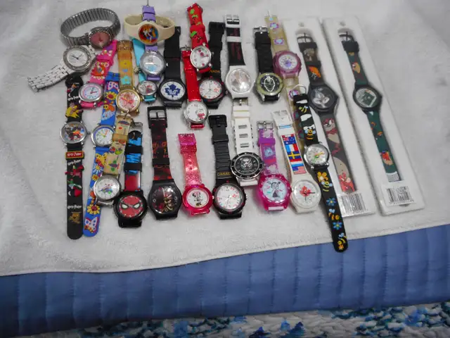28 watches all working Disney etc...