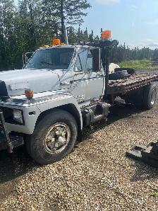 Older Ford Diesel winch truck