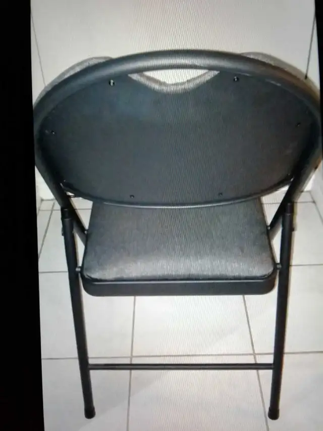 Folding chair, metal, padded seat & backrest $15