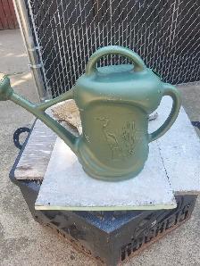 Large plastic watering can
