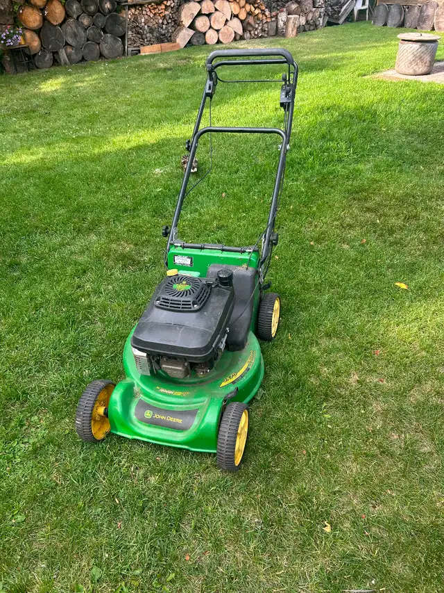 John Deere JX75  6.75hp Self Propelled Lawn Mower. $170