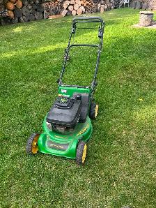 John Deere JX75  6.75hp Self Propelled Lawn Mower. $170