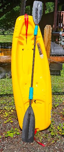 Solo kids kayak and paddle $100 located near terrace