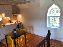 1-Bedroom Farmhouse Apartment | Vaulted Ceilings, Exposed Brick - Photo 4