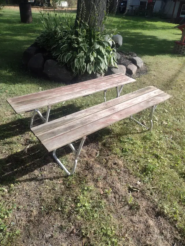 Two wood and metal benches